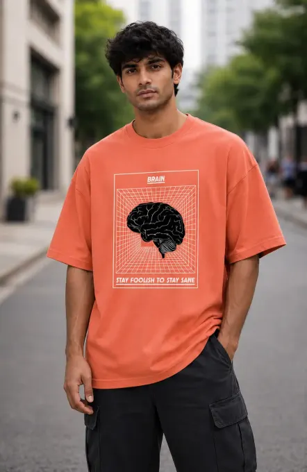 Oversized T-shirt with bold brain graphic printed on the front, shown flat-front view