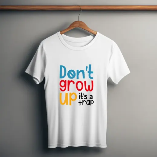 Supima cotton t-shirt featuring a bold "Don't Grow Up It's A Trap" graphic on the front