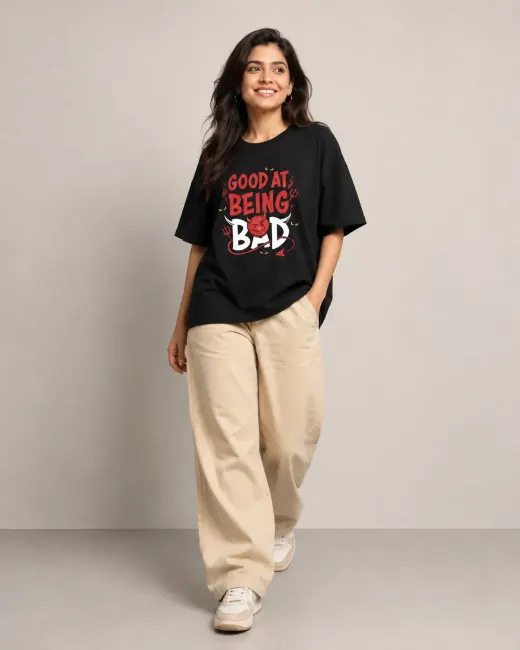 Good At Being Bad oversized black t-shirt with printed slogan, relaxed streetwear fit
