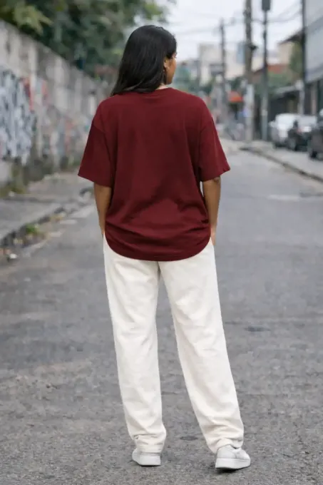 Maroon terry oversize t-shirt, front view on neutral background