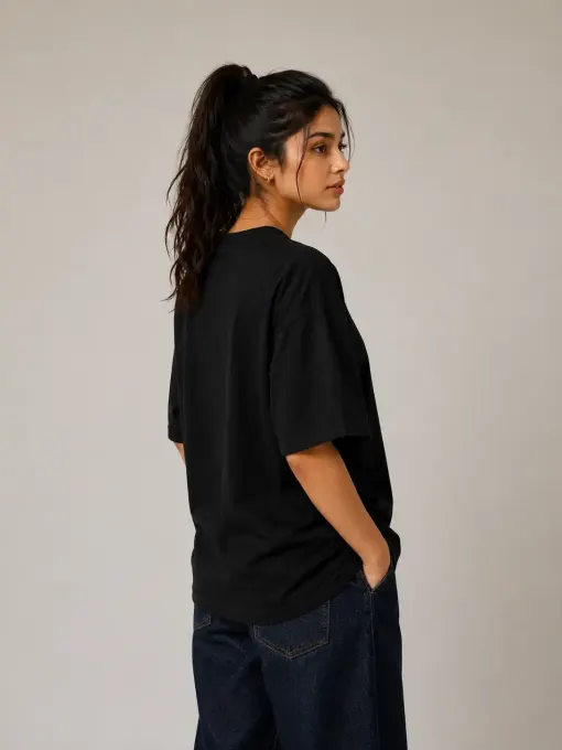 Oversized black graphic t-shirt featuring a Moon Ride artwork, front view