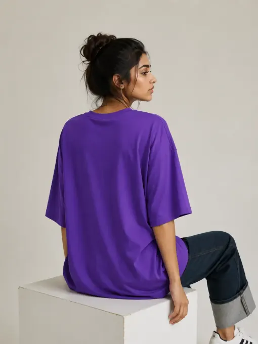 Oversized graphic t-shirt with ‘Never Trust Human’ print, front-facing view