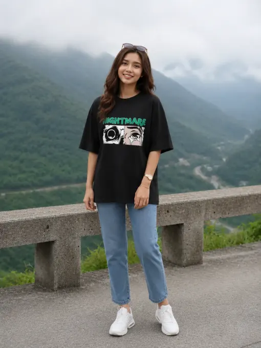 Black oversized graphic t-shirt with 'Nightmare' chest print