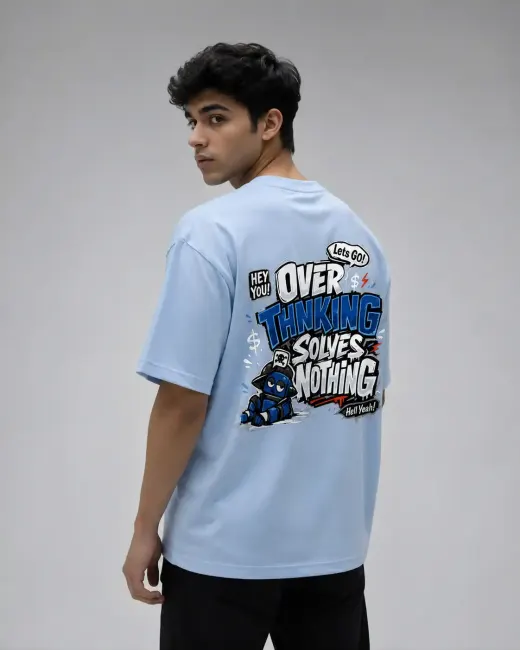Light blue oversized cotton-stretch t-shirt with black 'Overthinking Solves Nothing' graphic