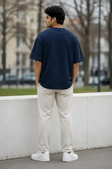 Model wearing the Perspective oversized graphic t-shirt in a relaxed, dropped-shoulder fit
