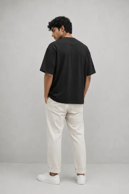 Perspective Oversized Graphic T-Shirt — front view on model showing oversized silhouette and graphic print