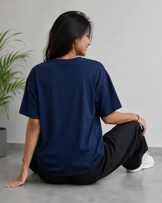 Perspective oversized graphic t-shirt — front view showing bold perspective print on an oversized cut against a neutral background