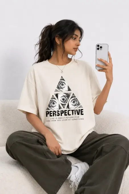 Perspective Oversized Graphic T-Shirt shown on model, relaxed oversized fit with front graphic