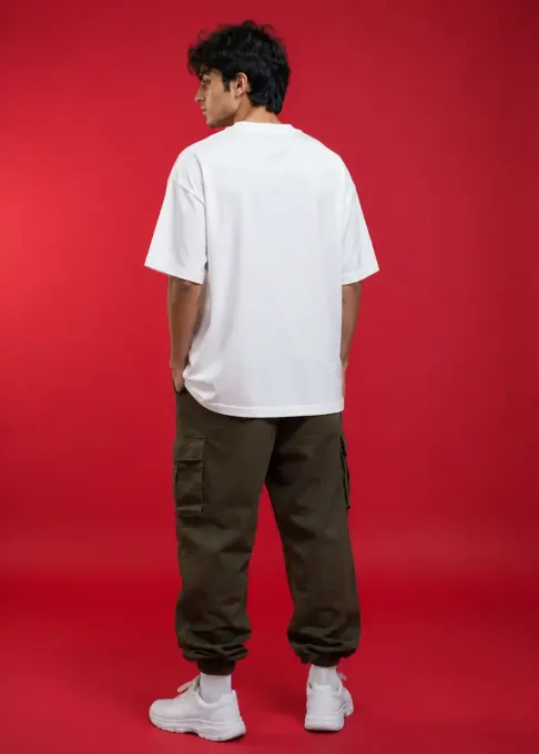 Model wearing Phenomena oversized white graphic t-shirt with relaxed, oversized fit and front graphic