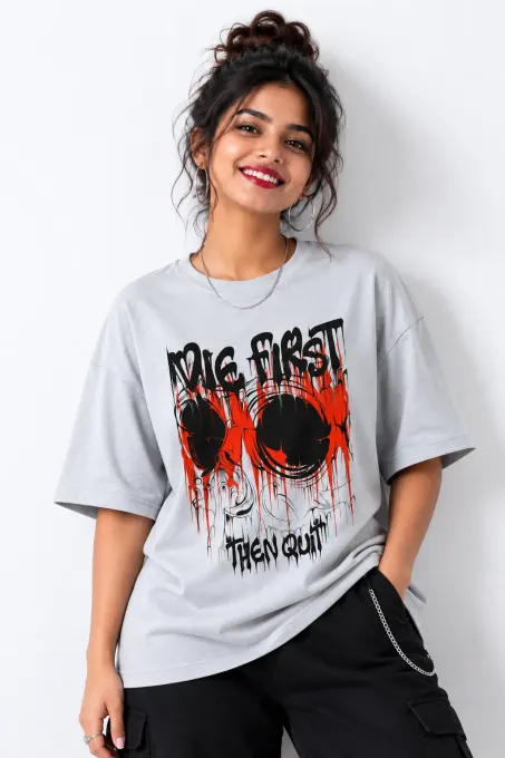 Oversized red tee with bold skull graphic on front