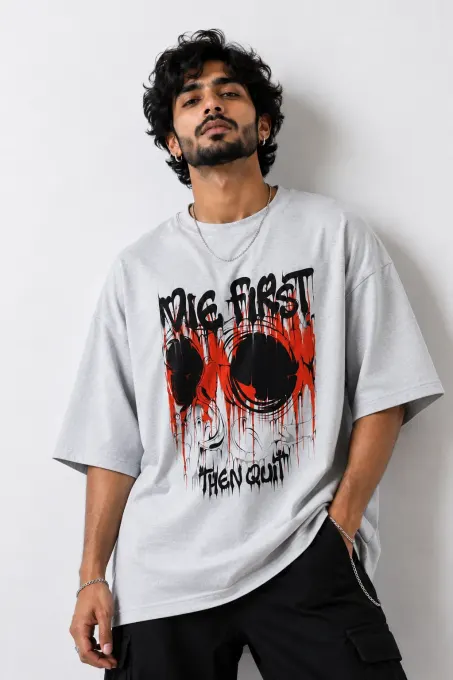 Oversized red cotton tee with bold white skull graphic on front, relaxed streetwear fit