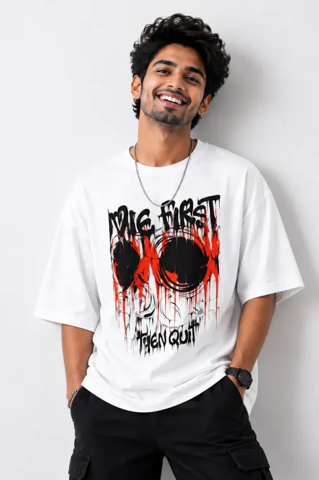 Red oversized tee with bold skull graphic centered on the chest