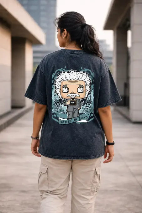 Unisex oversized acid-washed t-shirt with a vintage-style Albert Einstein 'Stay Curious' graphic, relaxed fit and soft washed cotton look