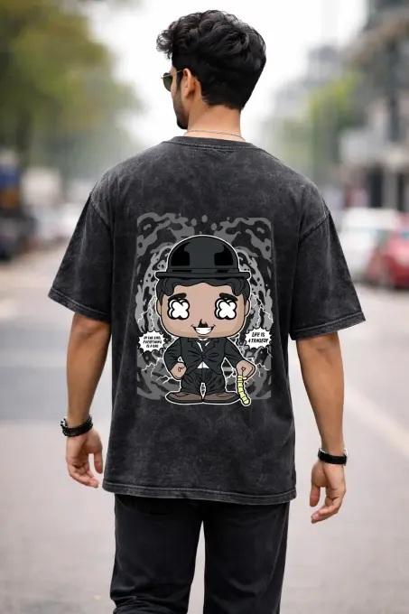 Unisex oversize acid-washed t-shirt featuring a Charlie Chaplin graphic