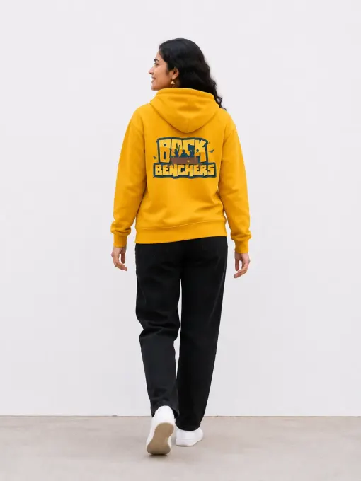 Starboy mustard yellow pullover hoodie laid flat, front view