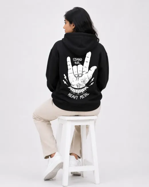 Black pullover hoodie featuring a heavy metal hand graphic on the front