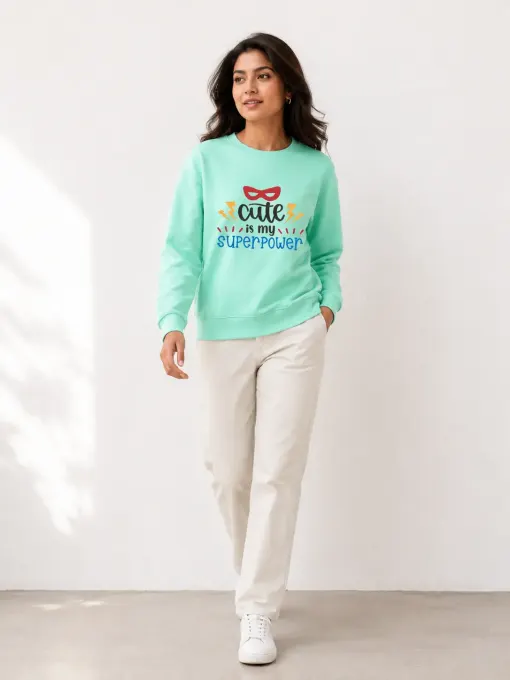 Crewneck sweatshirt with bold 'Cute Is My Superpower' graphic on front