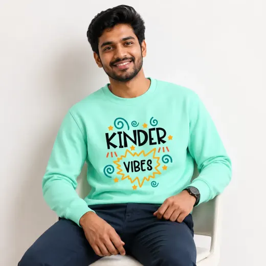Kinder Vibes Graphic unisex sweatshirt — front view showing graphic print