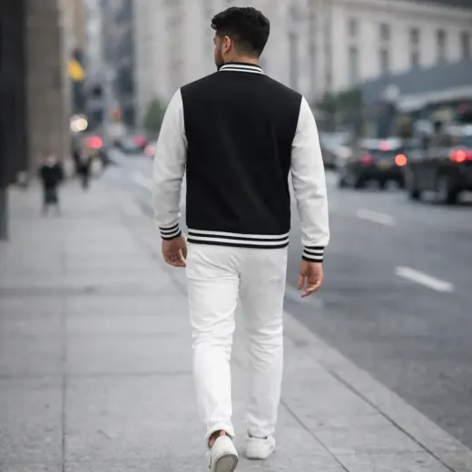 Black and white varsity bomber jacket, front view