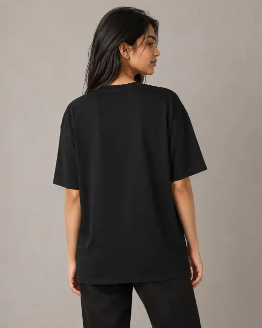 Oversized graphic t-shirt with stylized spider motif and 'Responsibility' text on the front
