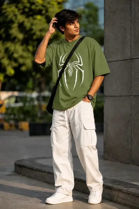 Oversized graphic t-shirt featuring a spider motif and 'Responsibility' text, front view on plain background