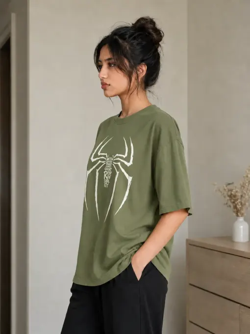 Black oversized cotton t-shirt with white spider graphic and ‘Responsibility’ text, relaxed streetwear fit