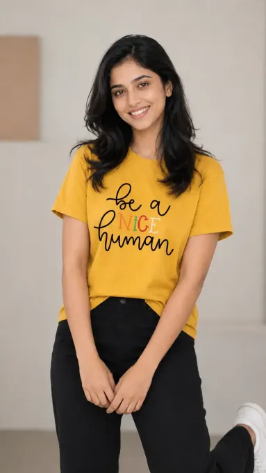Unisex "Be A Nice Human" typography crew t-shirt on plain background