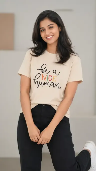 Unisex crewneck t-shirt featuring a bold 'Be A Nice Human' typographic print