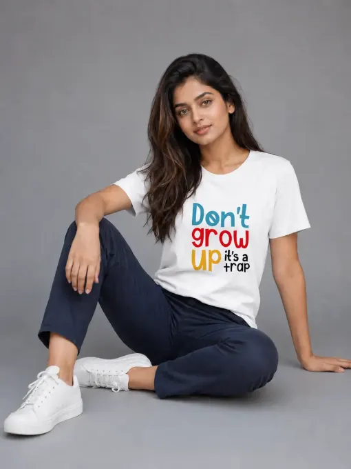Unisex classic crew t-shirt with 'Don't Grow Up It's A Trap' bold typography print