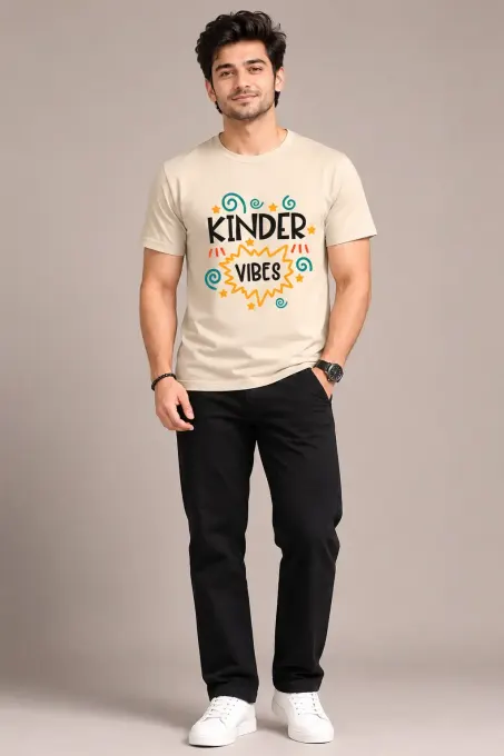 Unisex oversized white crew t-shirt with bold "Kinder Vibes" typography across the chest