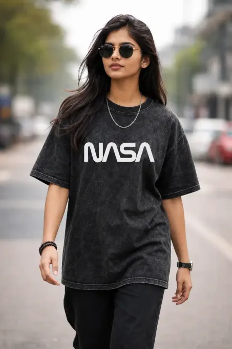 Unisex oversize acid-washed t-shirt featuring a NASA astronaut graphic