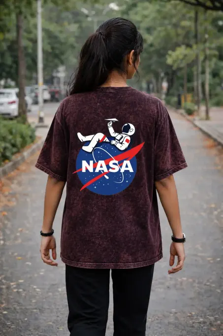 Unisex oversize acid-washed T-shirt with NASA astronaut graphic on front