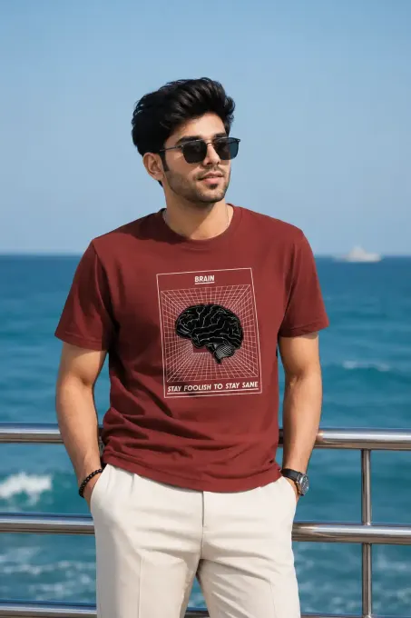 Unisex oversized classic crew t-shirt with a black 'Stay Foolish' brain graphic on the chest