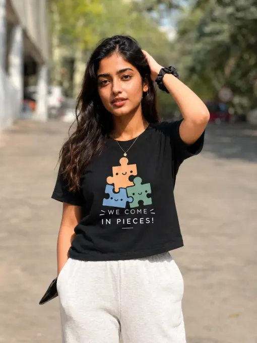 Front view of We Come In Pieces graphic Supima cotton t-shirt with printed artwork on a plain background